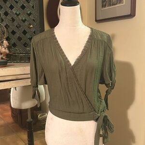 Super cute green wrap blouse, no tags but I believe it’s a small/medium